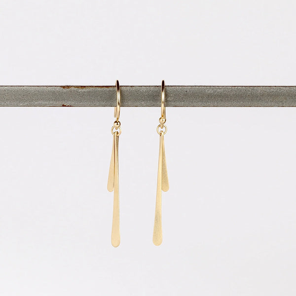 Double Fringe Drop Earrings in 14k yellow satin and matte gold by Carla Caruso on white background.