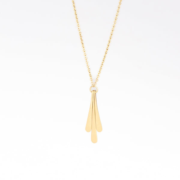 Triple Fringe Necklace on white background.