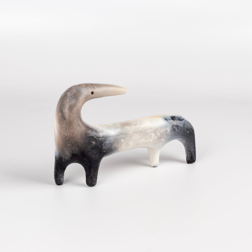 A ceramic creature  figurine made by Carol Horst.