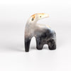 The ceramic creature is a one of a kind figurine formed from solid clay and refined by hand, this "one of a kind" ceramic creature is made out of white earthenware and white terra sigillata before getting pit fired in the wilderness. Made by Carol Horst in Los Angeles.