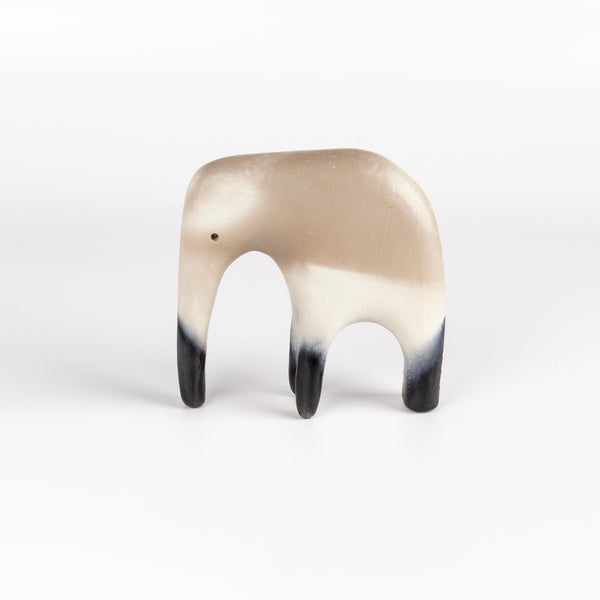 Formed from solid clay and refined by hand, this "one of a kind" ceramic creature is made out of white earthenware and white terra sigillata before getting pit fired in the wilderness. Made by Carol Horst in Los Angeles.