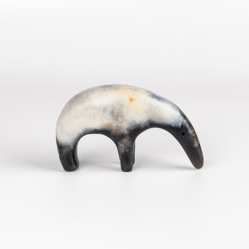 A one of a kind ceramic creature figurine made out of slab by hand and formed from solid clay and refined by hand, this "one of a kind" ceramic creature is made out of white earthenware and white terra sigillata before getting pit fired in the wilderness. Made by Carol Horst in Los Angeles.