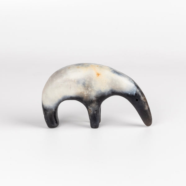 A one of a kind ceramic creature figurine made out of slab by hand and formed from solid clay and refined by hand, this "one of a kind" ceramic creature is made out of white earthenware and white terra sigillata before getting pit fired in the wilderness. Made by Carol Horst in Los Angeles.