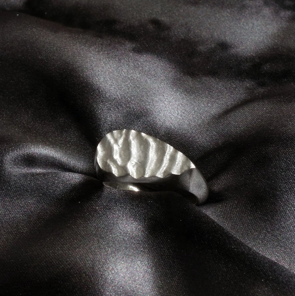 Tidal Teardrop signet ring in white gold.