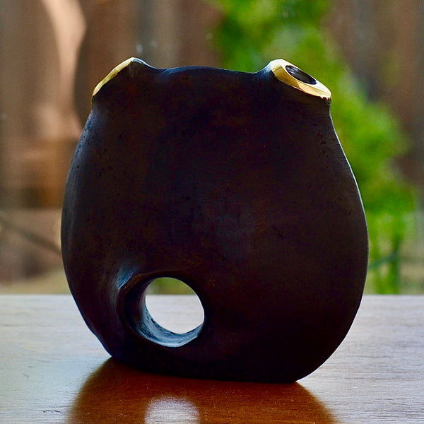 Aubock Vase 3789 Moon is a brass vase with patinated body and polished rim.
Designed by Carl Auböck and handmade in Austria.