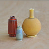 One more of the Dark Yellow, blue gray and reddish brown ceramic miniature vase trio by Yuta Segawa.