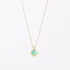 Duo Bale Offset Emerald Necklace by Elizabeth Street Jewelry is a  bezel set, translucent and offset square Colombian emerald with twin bales and on a 14k yellow gold chain. Perfect for layering or to wear as a solo piece. 