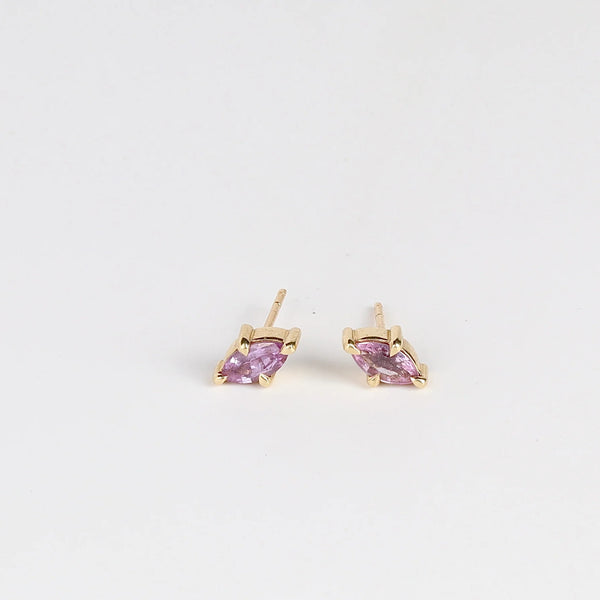 agle Claw Stud Earrings in Purple Sapphire by Elizabeth Street Jewelry are Marquise Sapphire Stud Earrings in violet purple to lilac that are bezel set marquise cut sapphires in a four prong eagle claw setting with post closure in 14k satin gold form these elegant everyday studs.