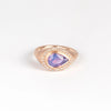 Sapphire Pear cut ring with Halo by Elizabeth Street Jewelry is a pear cut silky sapphire with a white diamond halo in rose gold.