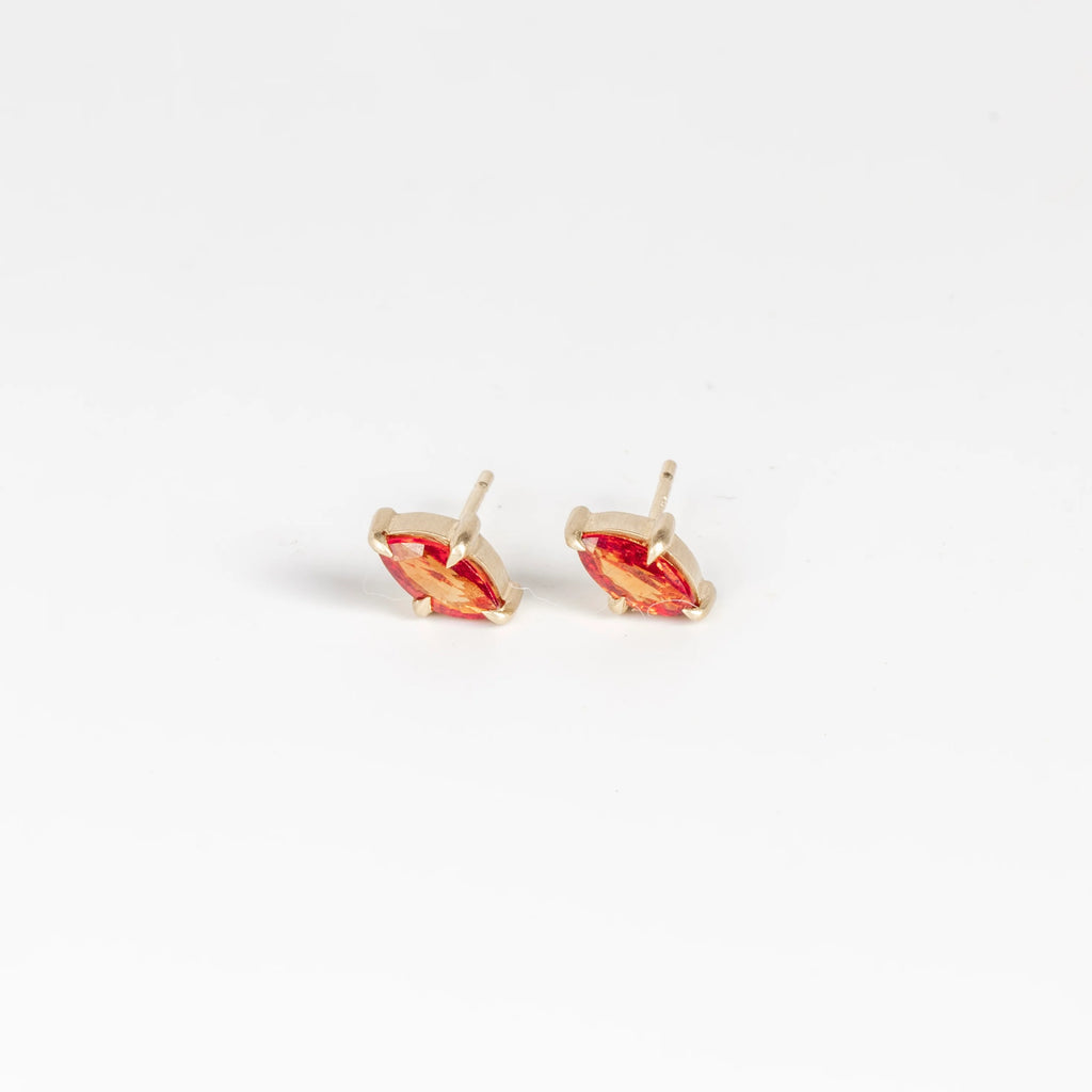 Prong Set Marquise Sapphire Studs in Orange by Elizabeth Street Jewelry. Great everyday earrings on white background.