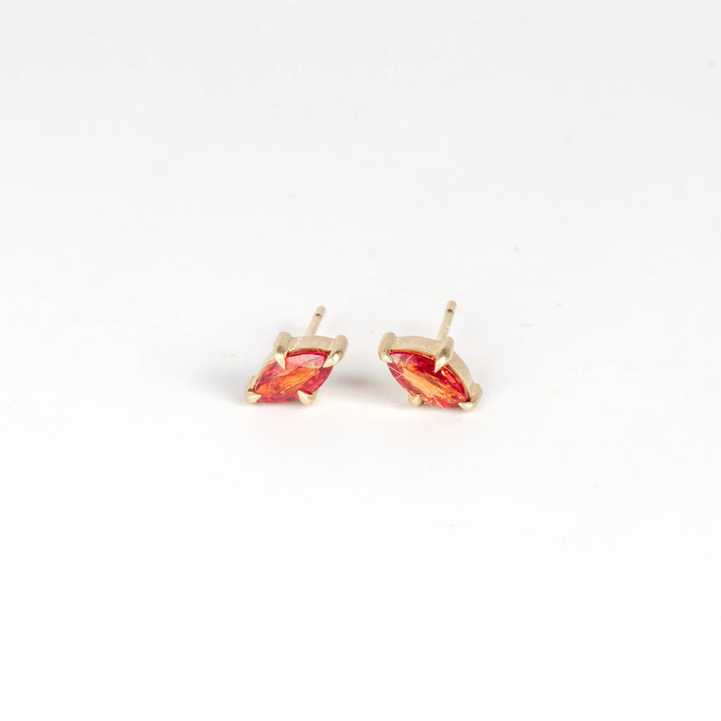 Prong Set Marquise Sapphire Studs in Orange by Elizabeth Street Jewelry. Great everyday earrings on white background.