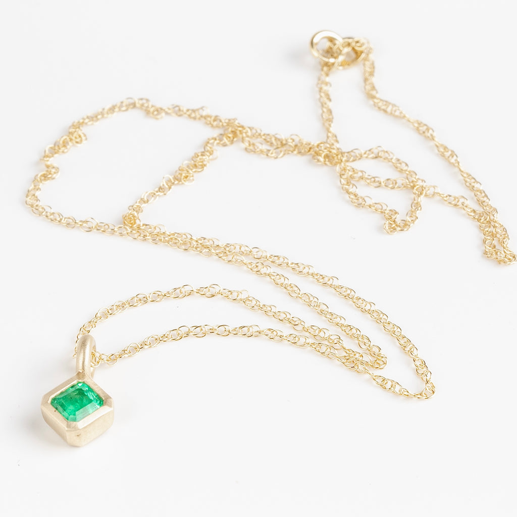 Full view of off-Set Emerald Pendant Necklace by Elizabeth Street Jewelry