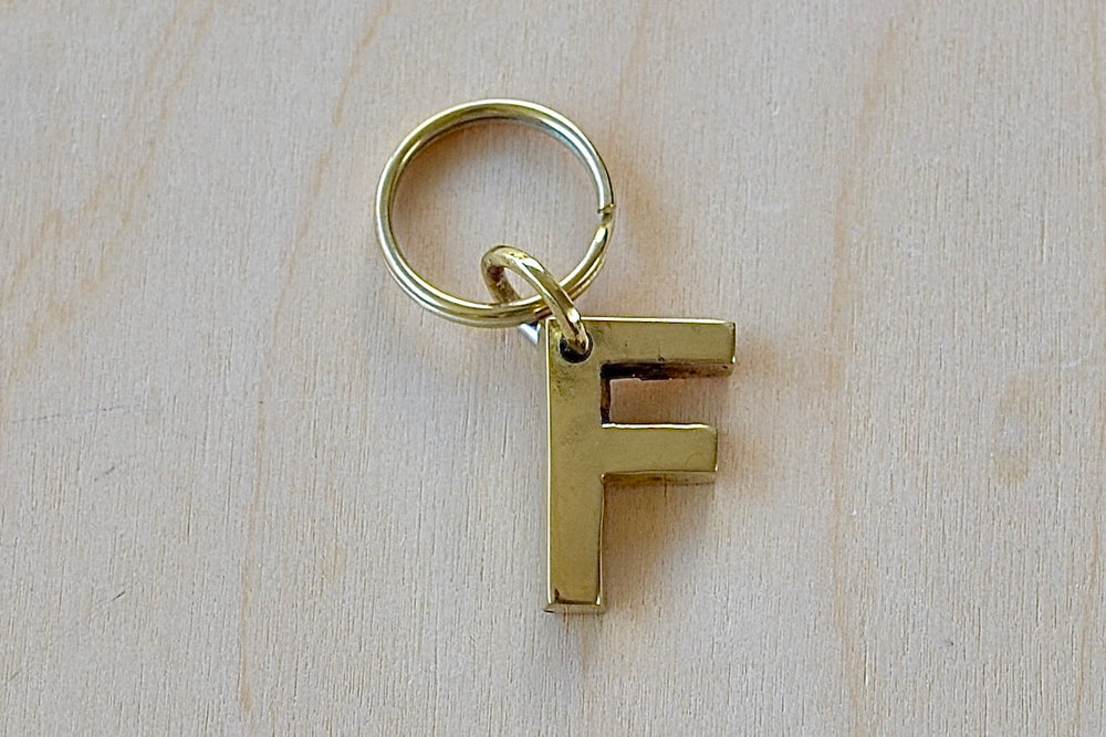 'F' Letter keyring, key chain, key ring in brass made by Carl Aubock. 