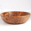 Circle Factory Bowl in Maple with ridges is a turned wood bowl in natural Maple by George Peterson. Made from salvaged wood in North Carolina. It is Food safe, but finish can be affected if in contact with anything acidic. 