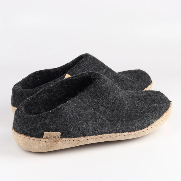 Felt slippers from Denmark made by Glerups on white background.