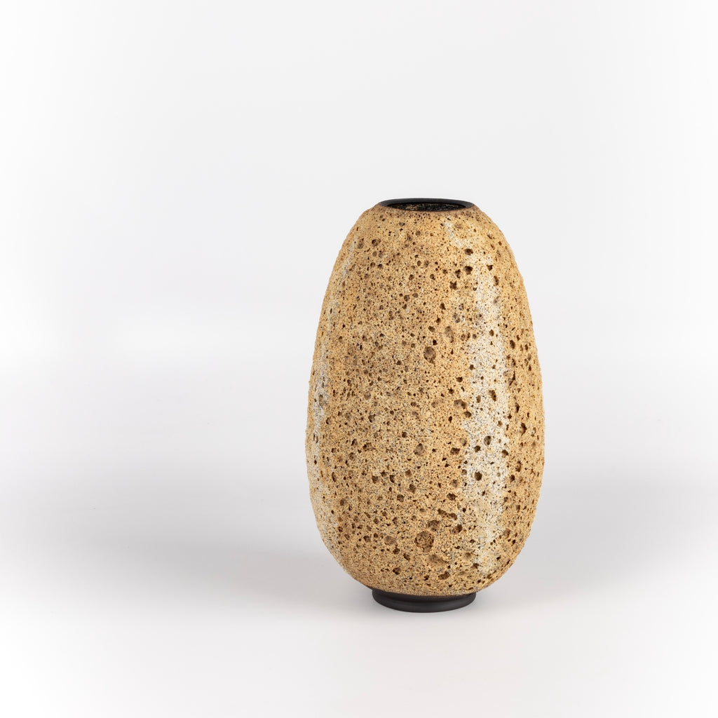 Other side of Hand thrown stoneware vase with volcanic glaze in light brown with cream stripes by Heather Rosenman. Made in Los Angeles.