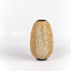 Hand thrown stoneware vase with volcanic glaze in light brown with cream stripes by Heather Rosenman. Volcanic Glaze. Made in Los Angeles.
