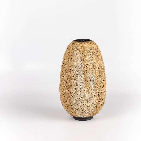 Hand thrown stoneware vase with volcanic glaze in light brown with cream stripes by Heather Rosenman. Volcanic Glaze. Made in Los Angeles.