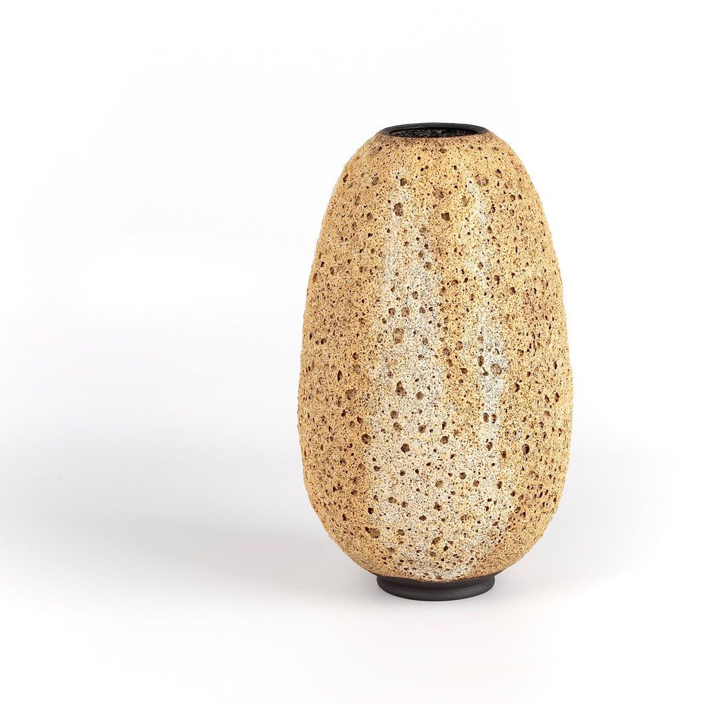Hand thrown stoneware vase with volcanic glaze in light brown with cream stripes by Heather Rosenman. Volcanic Glaze. Made in Los Angeles.