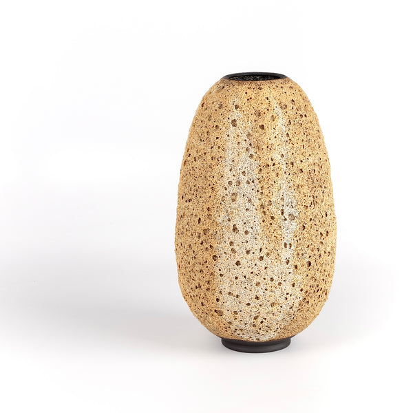 Hand thrown stoneware vase with volcanic glaze in light brown with cream stripes by Heather Rosenman. Volcanic Glaze. Made in Los Angeles.