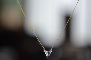 
            
                Load image into Gallery viewer, Charnières Pétale Pendant Necklace by Yannis Sergakis is twenty-Five (25) rhodium plated round cut diamonds that form a triangular pendant on an 18k gold chain. Utilizing a traditional Greek method, Yannis Sergakis created the Pétale collection which is made out of gold, rhodium plated round diamonds and architectural designs meant for everyday use.  Handmade in Athens, Greece.
            
        