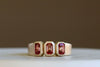 Triple Sapphire Band by Elizabeth Street Jewelry is made out of three rose sappires bezel set into a simple satin brushed and tapered band in 14k yellow gold. Handmade in Los Angeles.