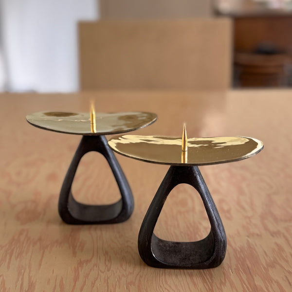 Aubock Candle Holders 3470 with open base are a set of candle holders with open patina brass base and polished top. 