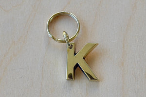 'K' Letter keyring, key chain, key ring in brass made by Carl Aubock. 