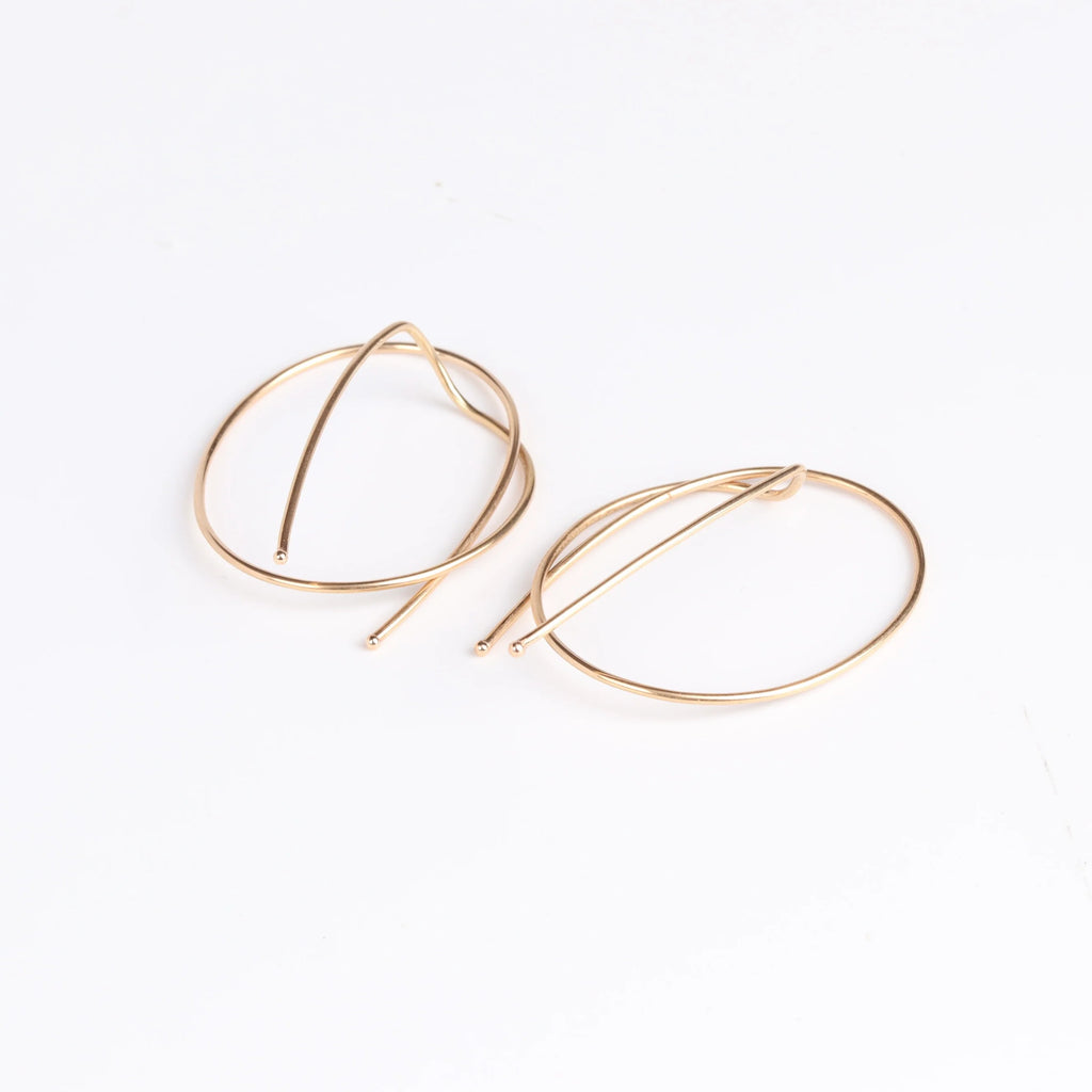 Medium rope earrings on white.