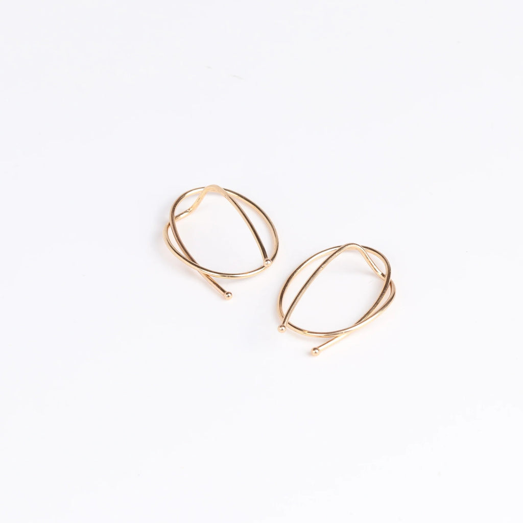 Small  rope earrings on white.