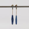 Lapis and Kyanite on Stick and Strand Earrings by Kathleen Whitaker are One of a kind kyanite stones with natural inclusions that are drilled and prism shaped and attached to Kathleen Whitaker's signature stick and strand with post closure. Stone collection.