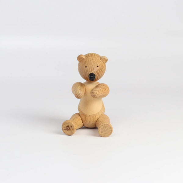 Kay Bojesen Bear in untreated oak on white background.