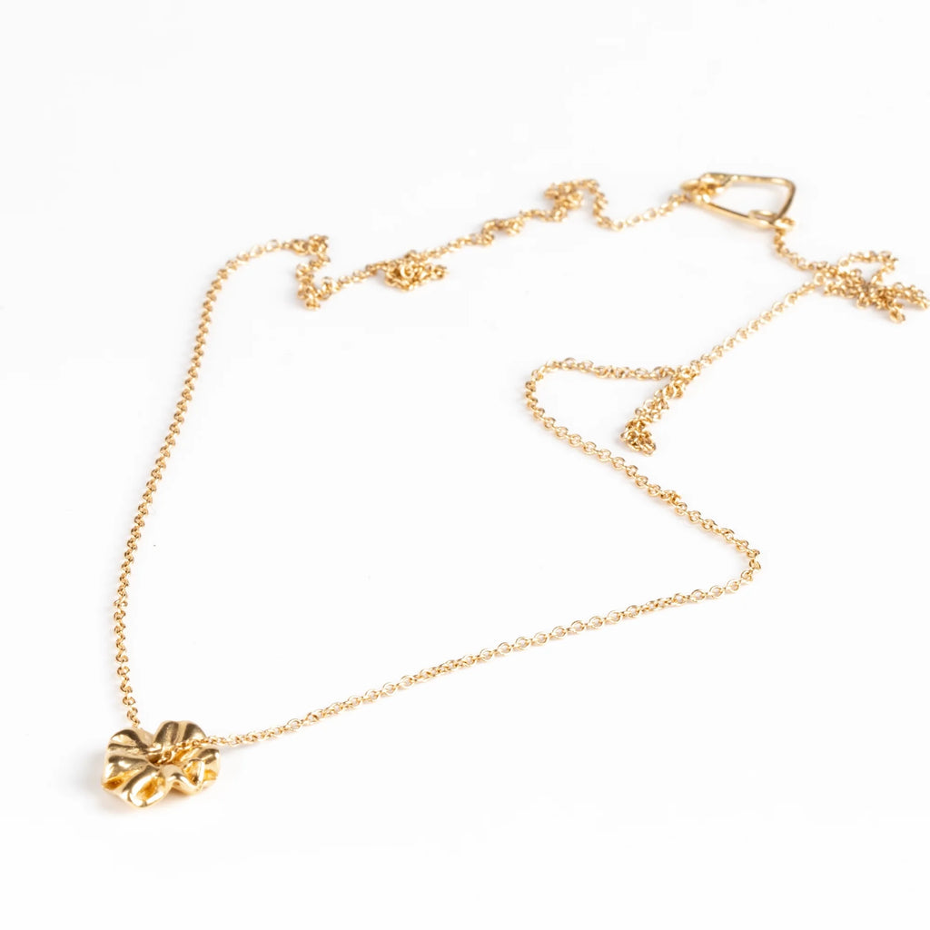 Full view of Ruffle Bead Necklace by Kaylin Hertel on white background. This is a 14k yellow gold bead on an 18" inch chain.