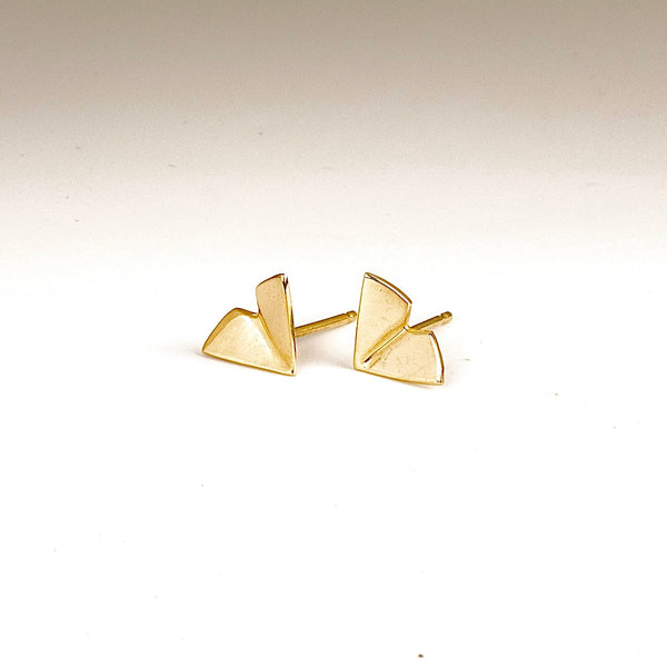 Large Kaylin Hertel Origami stud Studs Earrings in 14k yellow gold on white background.