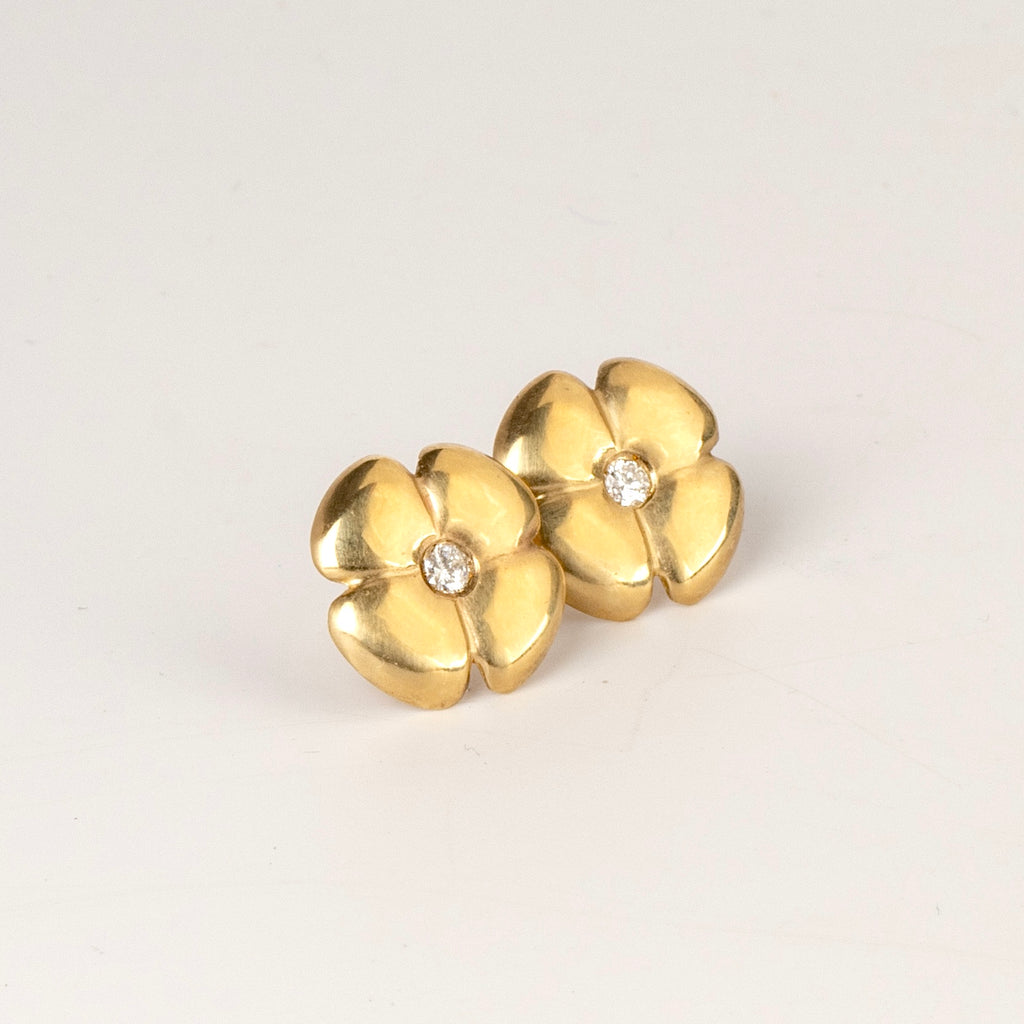 Large flower stud by Kaylin Hertel in white diamond on white background.