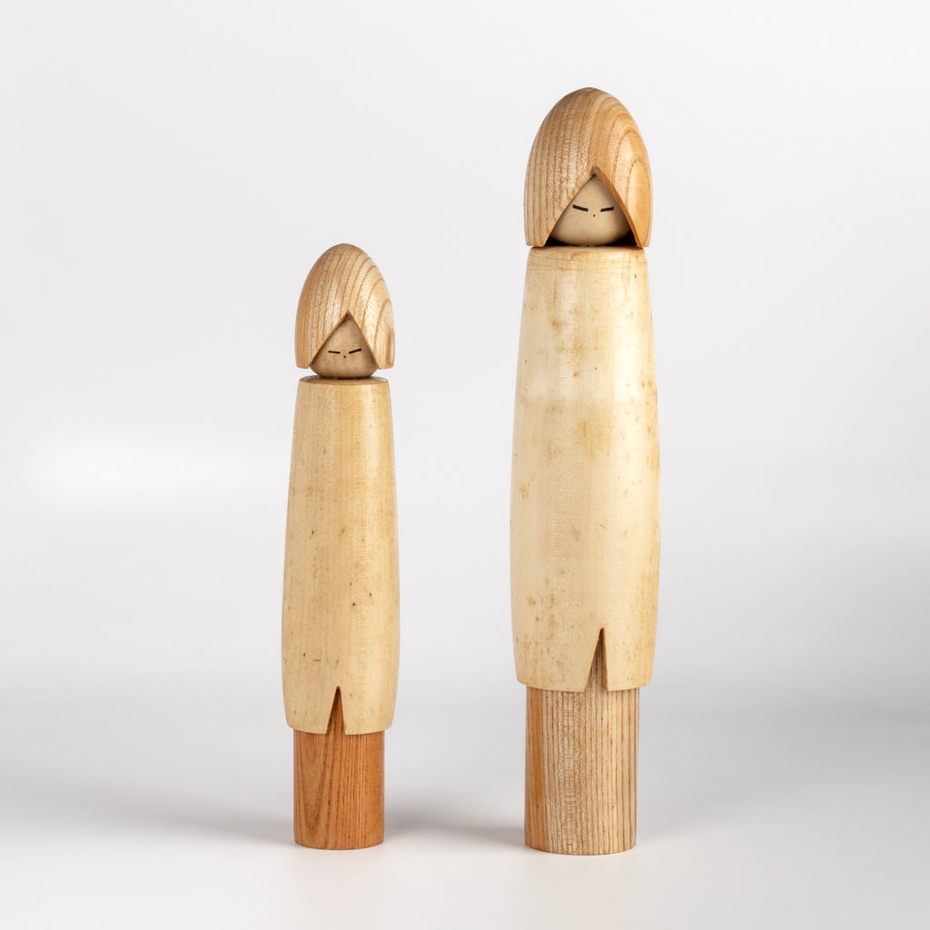 A pair of Sosaku Kokeshi by well known woodworker Shido Shozan (1932-1995), winner of Prime Minister's Prize in 1962. 