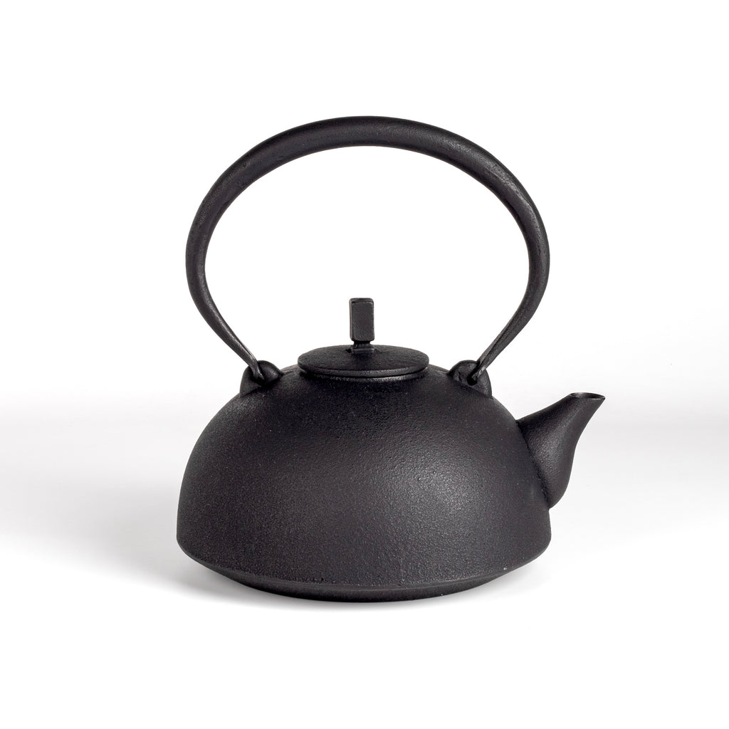 Cast Iron Kettle Nambu Large by Kukan Chuzo is made in traditional Nambu Tetsubin style. It is meant for stovetop use. It is not coated with enamel therefore naturally softens the water by enriching it with iron. The more use it gets the better the water. Make sure to pour out every drop of water after use, remove the lid and let the kettle dry so it doesn't rust.&nbsp; Made and designed by Hisao Iwashimizu in Iwate, Japan.