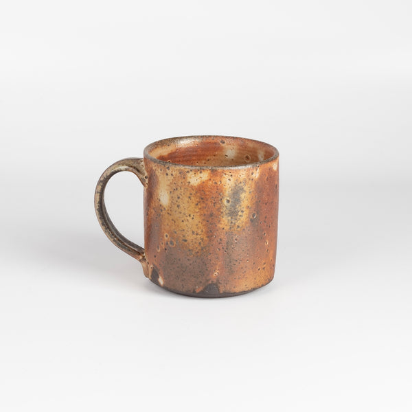 Other side of wood fired mug cup by Lindsay Oesteritter.