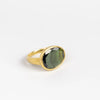 Green Tourmaline Greek ring by Pippa Small on white background.