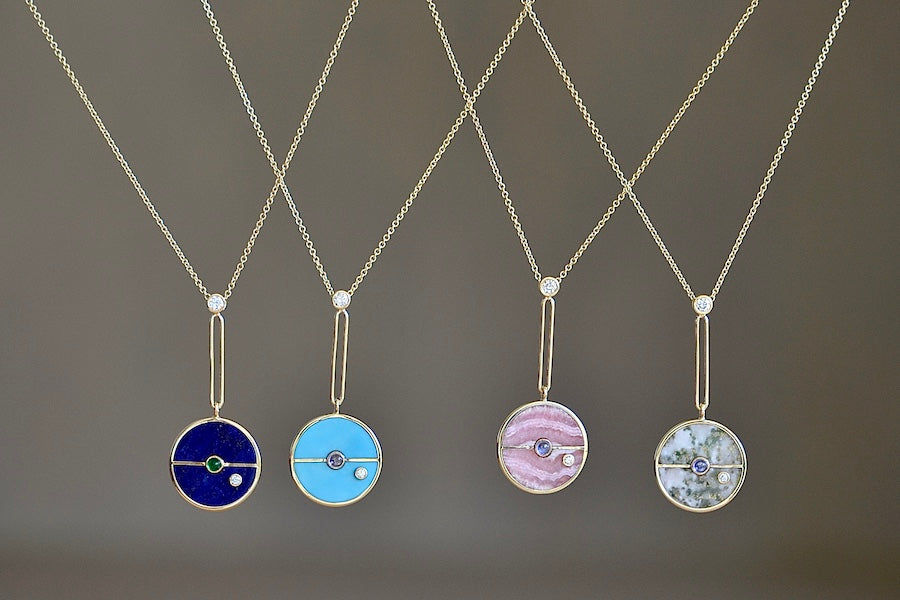 Mix of Compass Pendant Necklaces by Retrouvai. Made in LA.