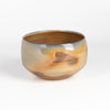Wood Fired Tea Bowl #2 is a one of a kind wood fired and reduction cooled  matcha tea bowl in peach, brown, blue and gray. It's hand thrown and porcelain by Lilith Rockett. 