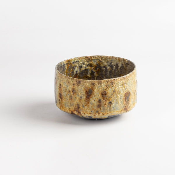 Kazegama Wood Fired Tea Bowl With Spots is a one of a kind wood fired and reduction cooled tea bowl in bluish grays and browns with a textured side of brownish beige and dark spots. Hand thrown porcelain by Lilith Rockett, who works out of Portland, Oregon.