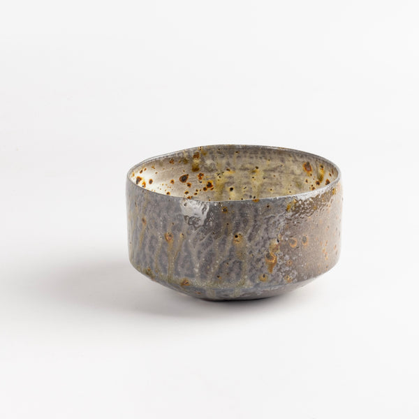 Kazegama Wood Fired Tea Bowl With Spots on White by Lilith Rockett is a one of a kind wood fired and reduction cooled tea bowl in bluish grays, browns and white with dark spots. Hand thrown porcelain by Lilith Rockett, who works out of Portland, Oregon.
