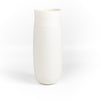 Lilith Rockett Tall vase is reminiscent of an eggshell. It is hand thrown porcelain with gloss glaze on the interior and an unglazed exterior that has been sanded smooth and it is very stable despite its rounded bottom. Handmade in Portland, Oregon. 