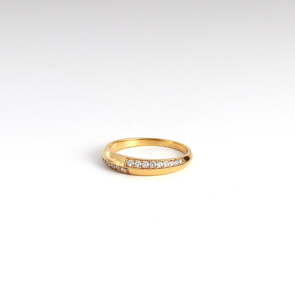 Petite Crescent Ring with Switch Pavé designed by Lizzie Mandler on white.