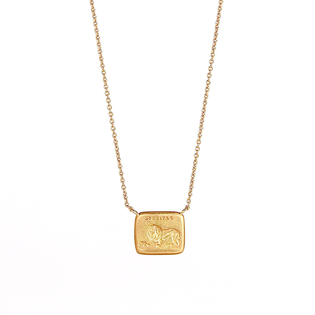 Lion and the Mouse Duo Motto Necklace by Makita Wakita in 18k yellow gold on white background. 