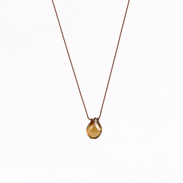 Cognac Quartz Zen Gem designed by Margaret Solow is an Individual translucent and faceted brown Cognac quartz gem on string makes this one of a kind organic pendant necklace. Designed by Margaret Solow. Handcrafted in Los Angeles.