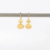 Two tier rain earrings by Marian Maurer in in 18k yellow brushed and polished gold on white background. Best everyday earrings.
