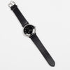 Full image of Max Bill 38mm Automatic Watch in Black Dial with Numbers but no date and black leather band, a modernist classic designed wrist watch by designer Max Bill for Junghans.
