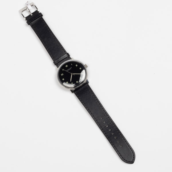 Full image of Max Bill 38mm Automatic Watch in Black Dial with Numbers but no date and black leather band, a modernist classic designed wrist watch by designer Max Bill for Junghans.